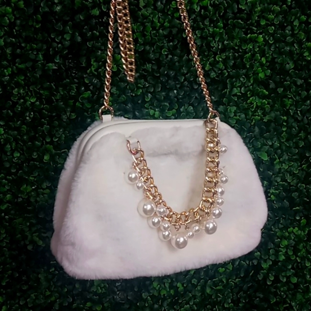 White fluffy purse (faux fur)with pearls and a gold chain